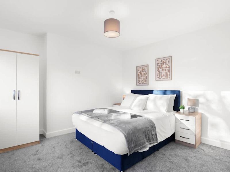 A double bedroom made up with fresh linen