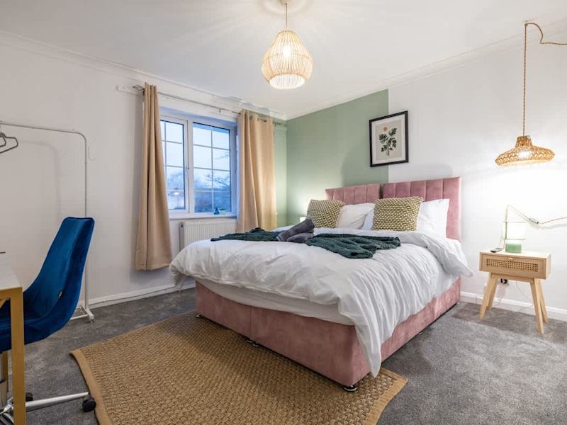 A double bedroom made up with fresh linen