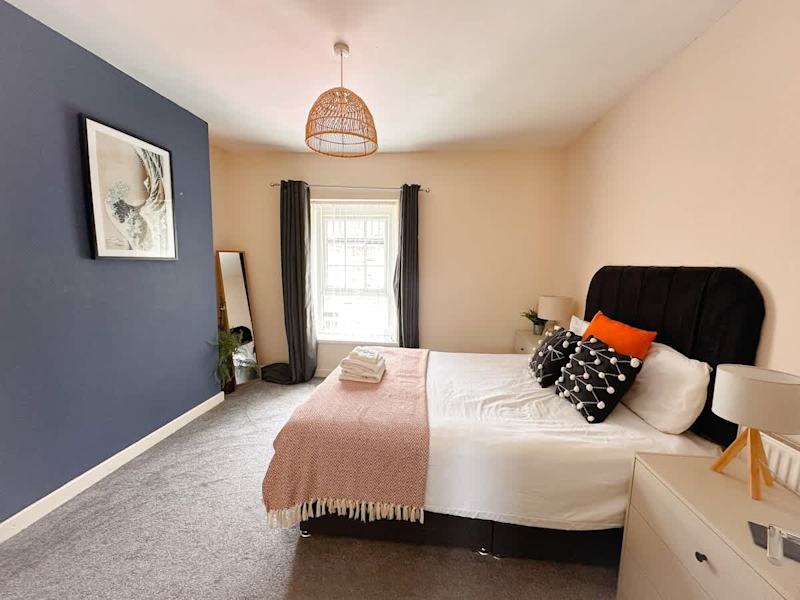A double bedroom made up with fresh linen