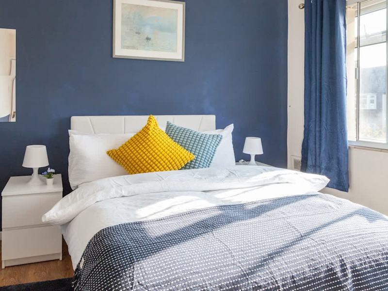 A double bedroom made up with fresh linen