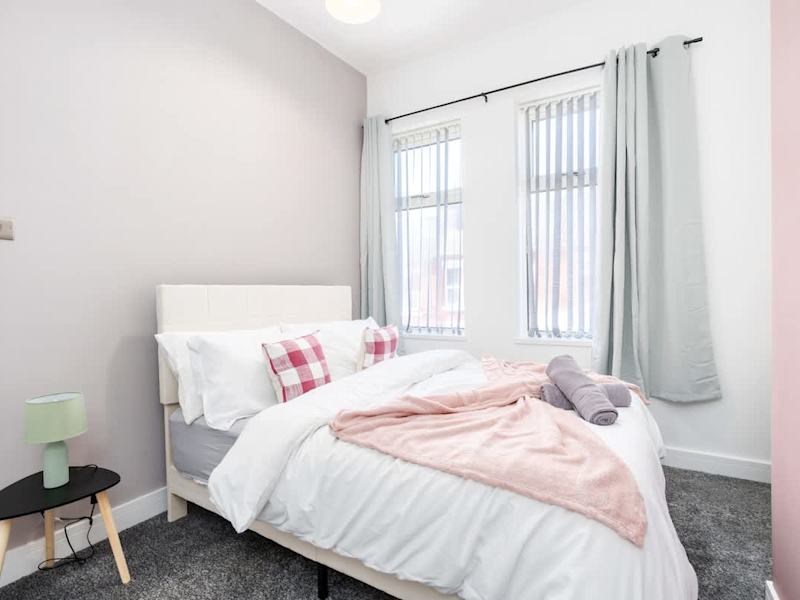 A double bedroom made up with fresh linen