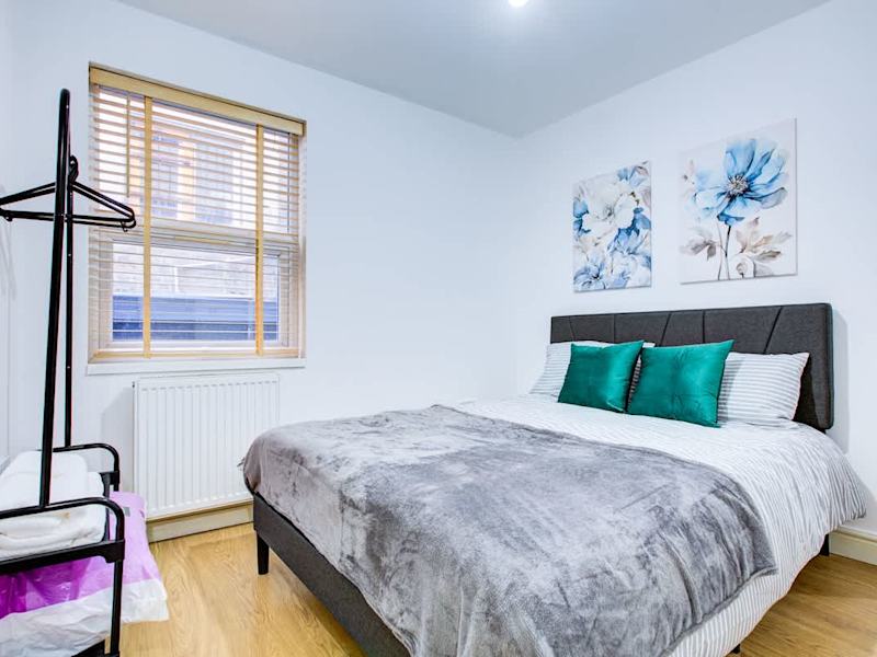 A double bedroom made up with fresh linen