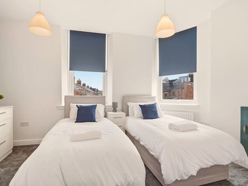 A double bedroom made up with fresh linen