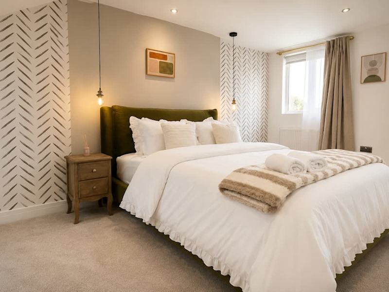 A double bedroom made up with fresh linen