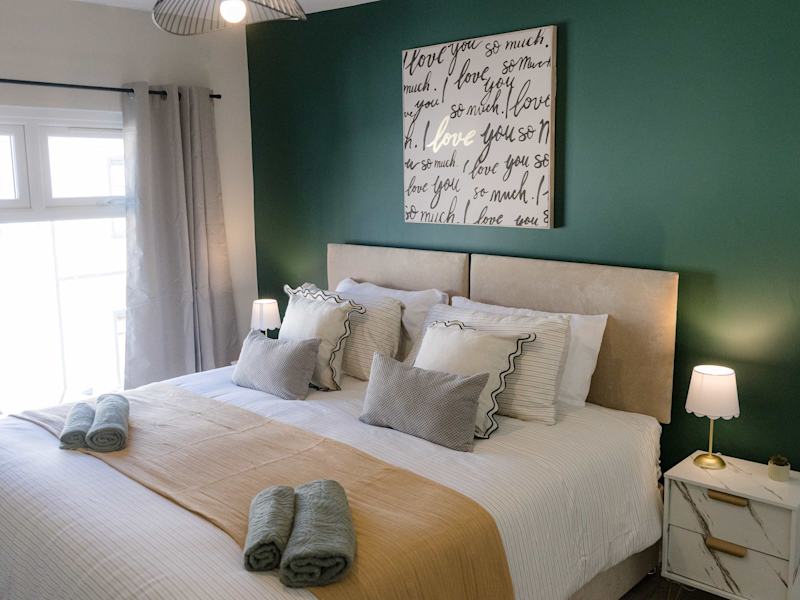 A double bedroom made up with fresh linen