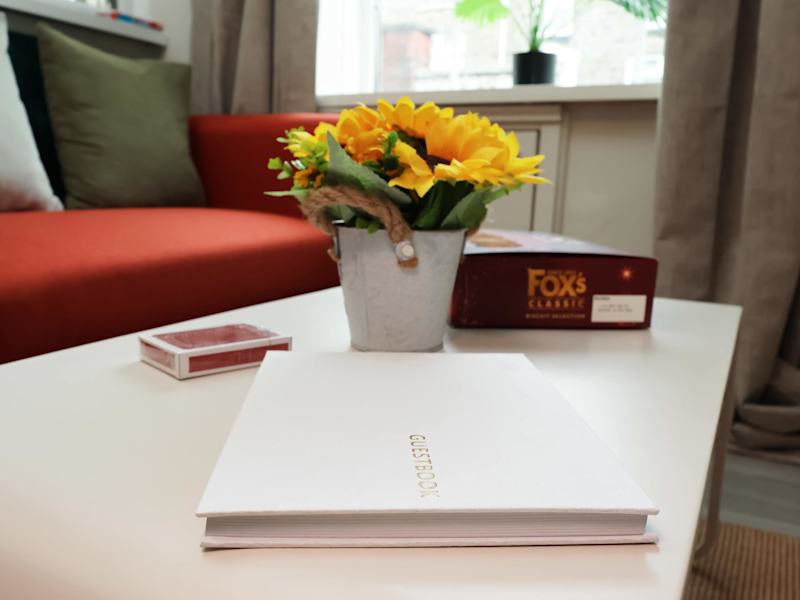 A table set with fresh flowers for arrival