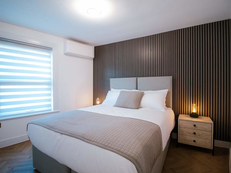 A double bedroom made up with fresh linen