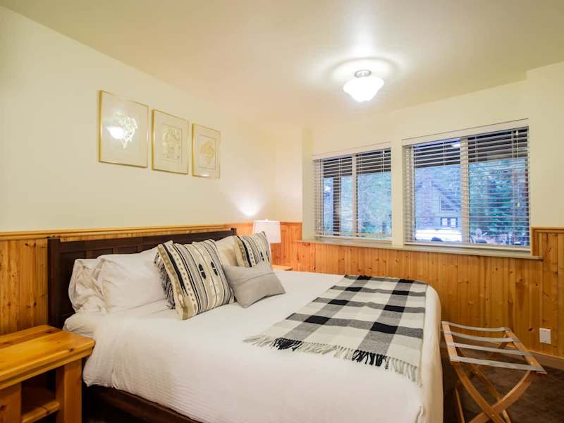 Bottom floor bedroom with king bed. 
