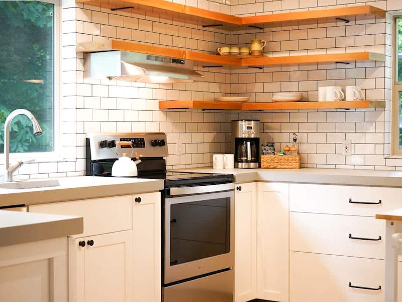 Chefs kitchen with new appliances and coffee bar. 