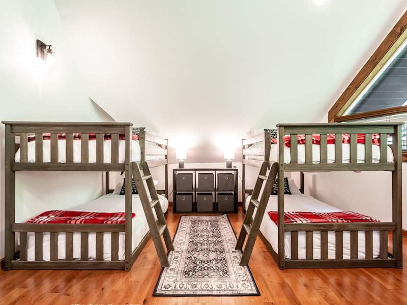 Bunk room with four twin beds