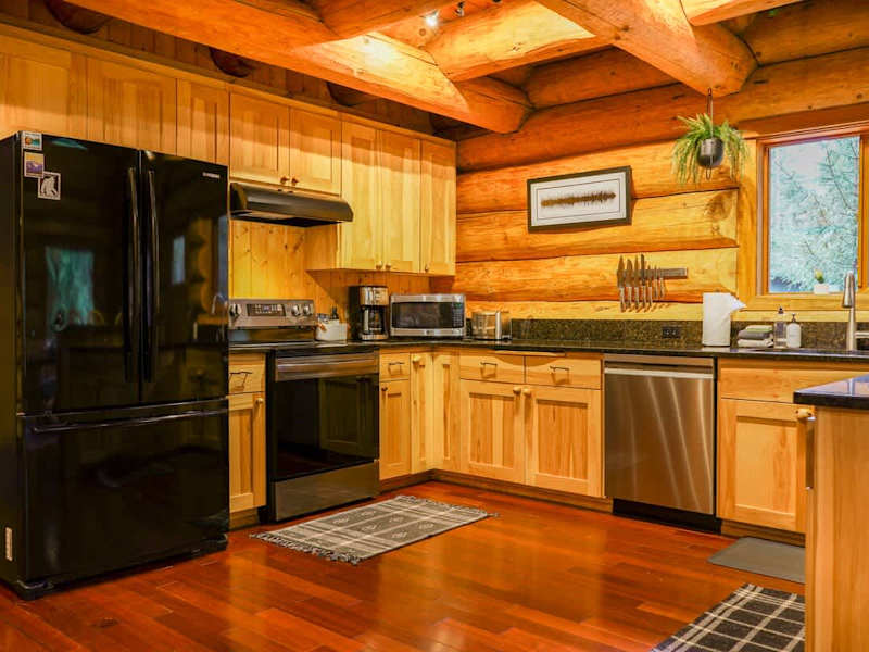 Enjoy cooking in the large and fully equipped kitchen, right across from the living room. 