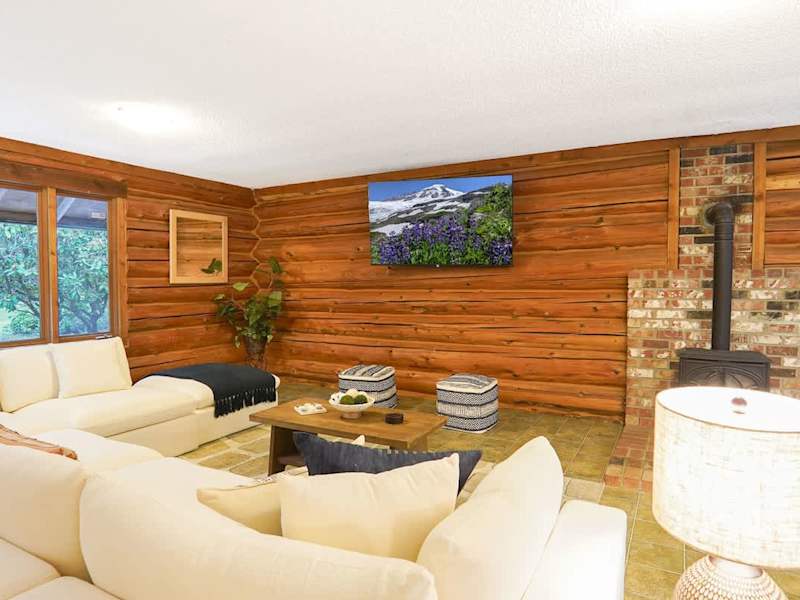 Secondary living room with smart tv. 
