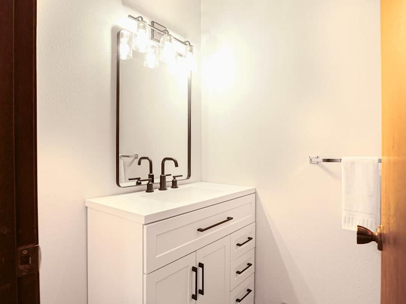 Half bath in downstairs den bedroom.