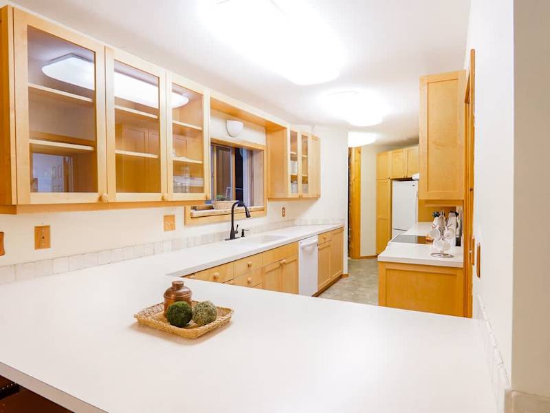 Large kitchen with new appliances and plentiful storage. 