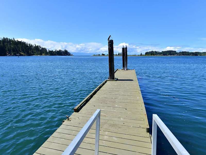 Private dock with deep water moorage.