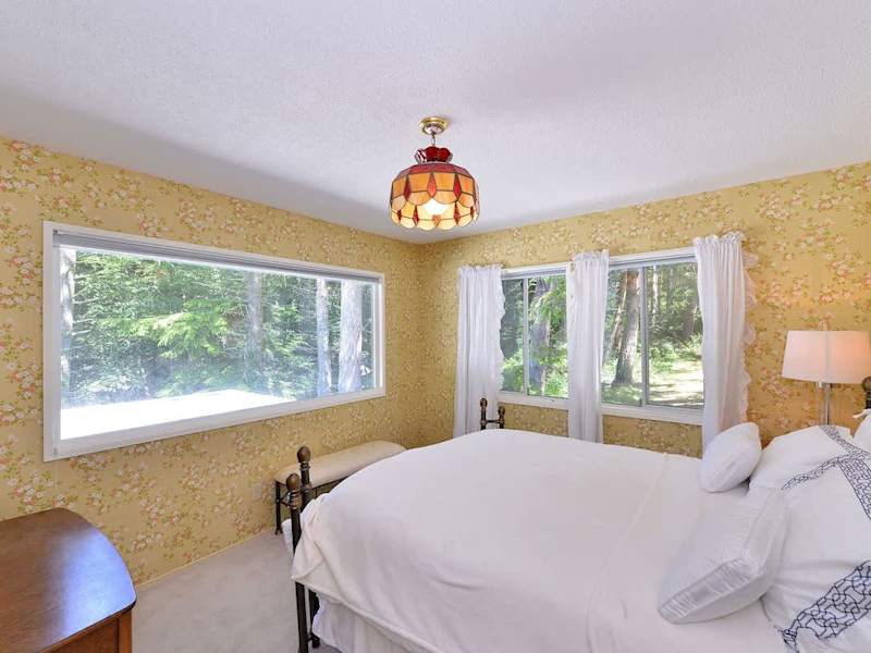 Bedroom with rainforest views.