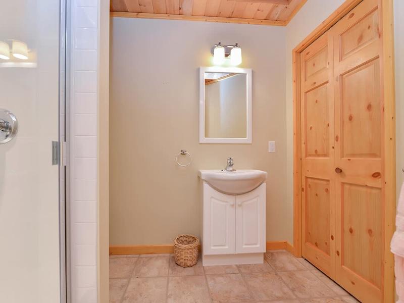 Cabin acts as fourth bedroom and third bathroom. 