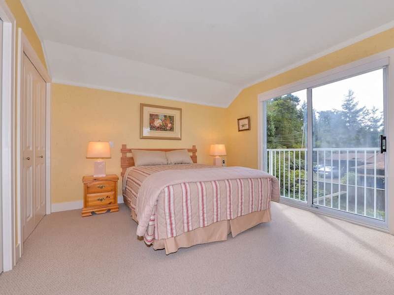 Master bedroom with step out balcony on second floor. 