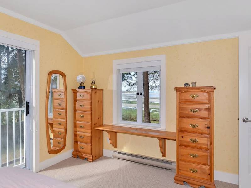 Master bedroom with step out balcony on second floor. 