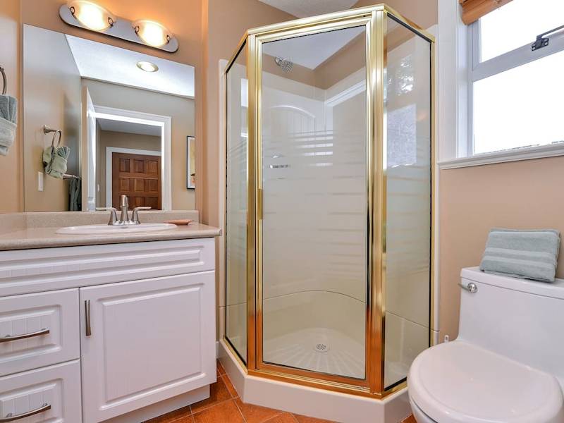 Main level bathroom with walk in shower. 