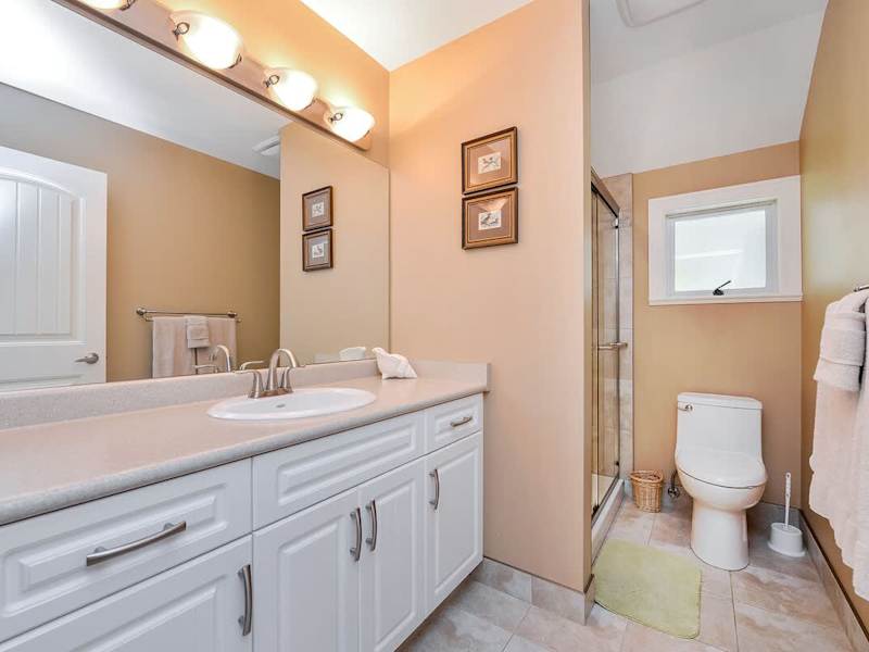 Second floor level bathroom with walk in shower. 