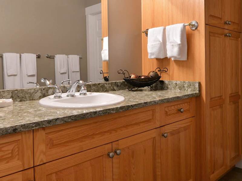 The four piece bathroom is shared by both the third and fourth bedroom.