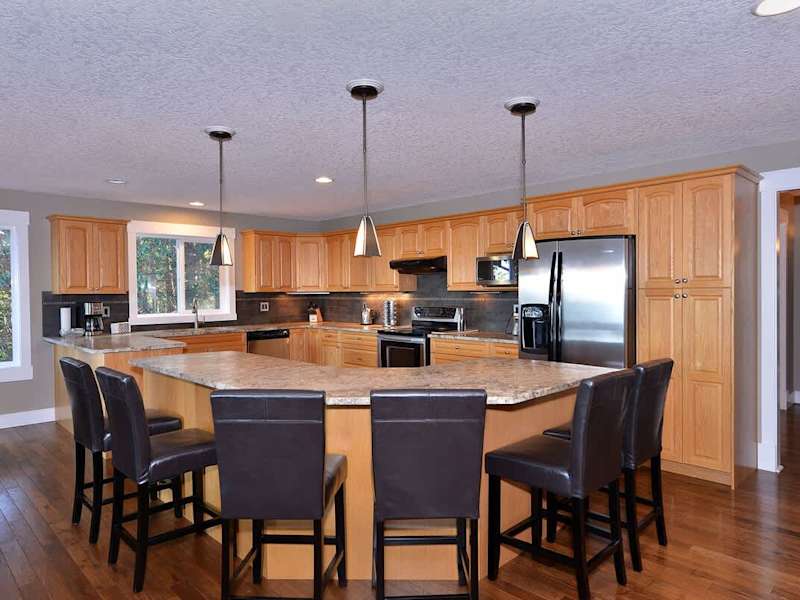 The kitchen island seats six comfortably.
