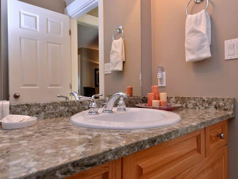 Two piece bathroom located on the main level of the home.