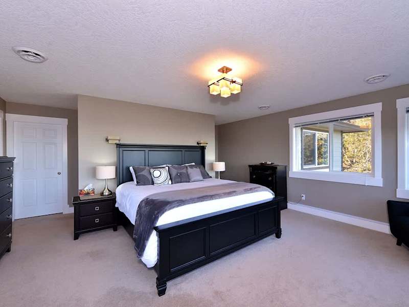 Massive master bedroom with king size bed. 