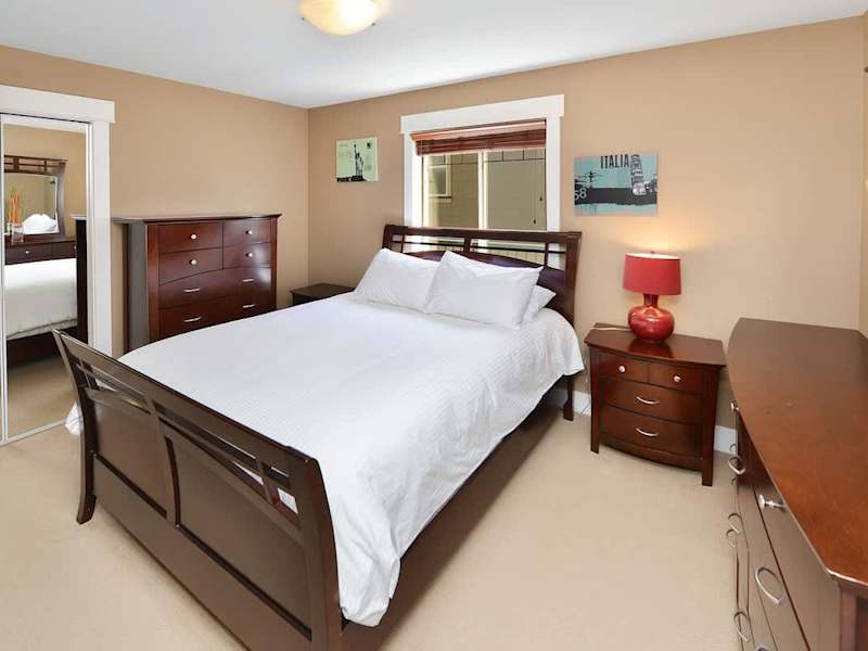 Main level 4th bedroom with Queen Bed. 