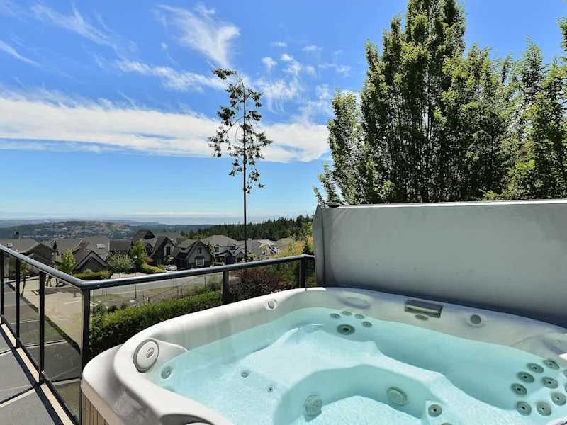 Upper Main Level Deck Space with Hot Tub and Views.