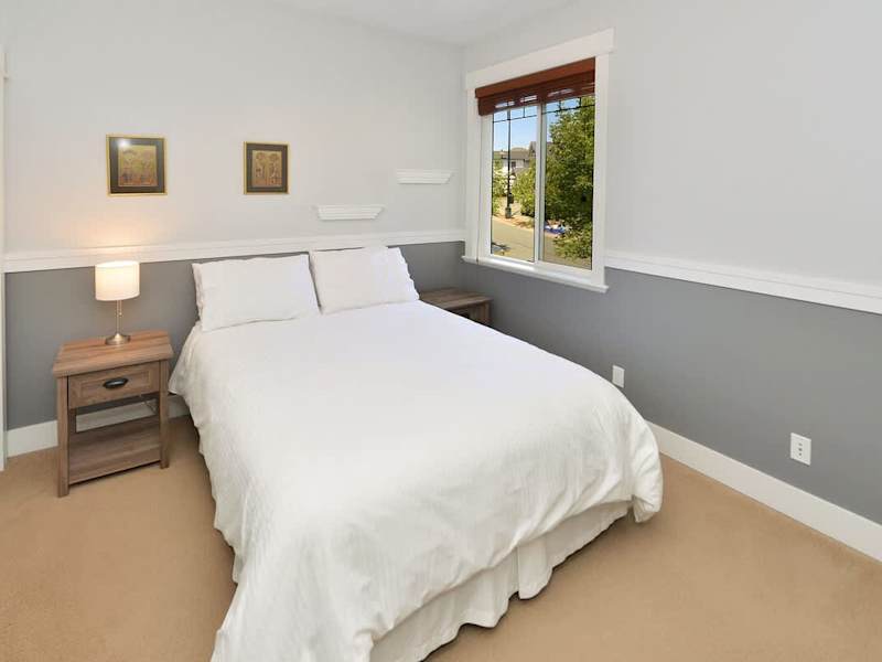 Upper Main Floor 2nd Queen Bedroom. 