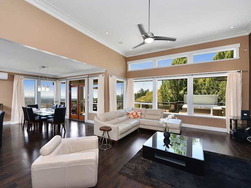 Upper main level living, kitchen, and dining space. 