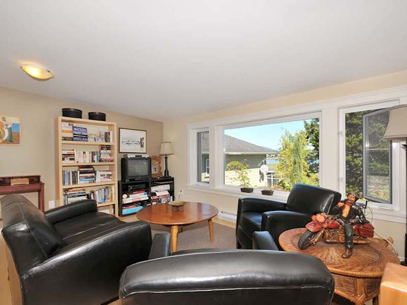 Sitting area at the loft bedroom with stunning ocean and garden views.  