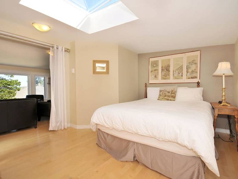 A spacious loft with queen sized bed. 