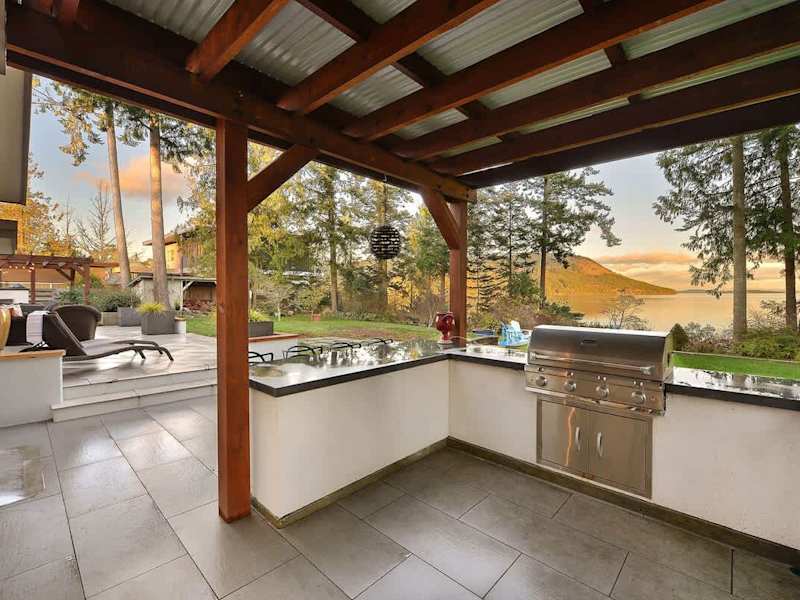 Covered outdoor kitchen for your stay.