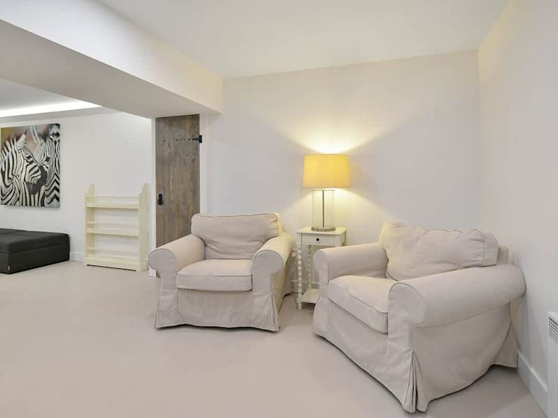 Lower level family room for family fun.