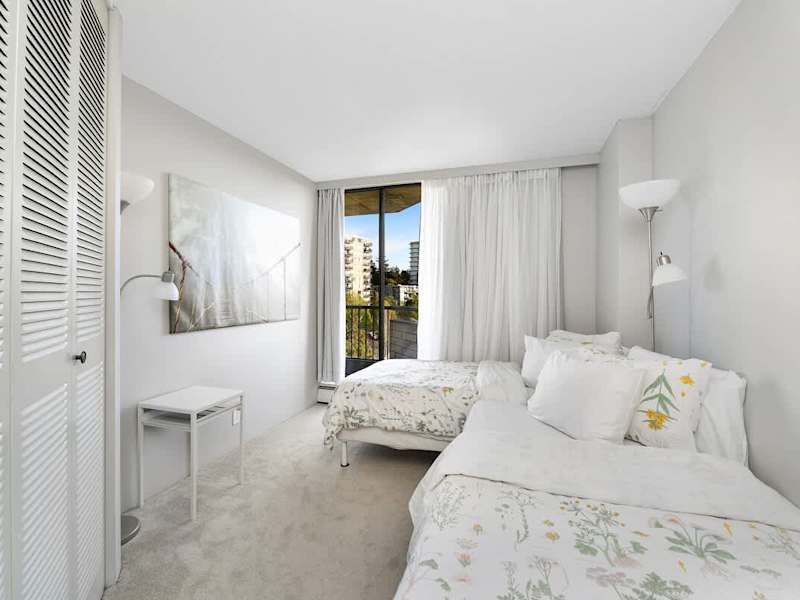 Second bedroom with two twin beds.