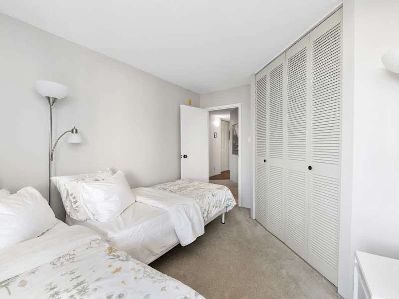 Second bedroom with two twin beds.