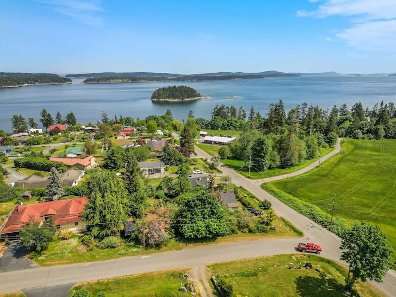 Drone aerial photo above the cottage facing the ocean.