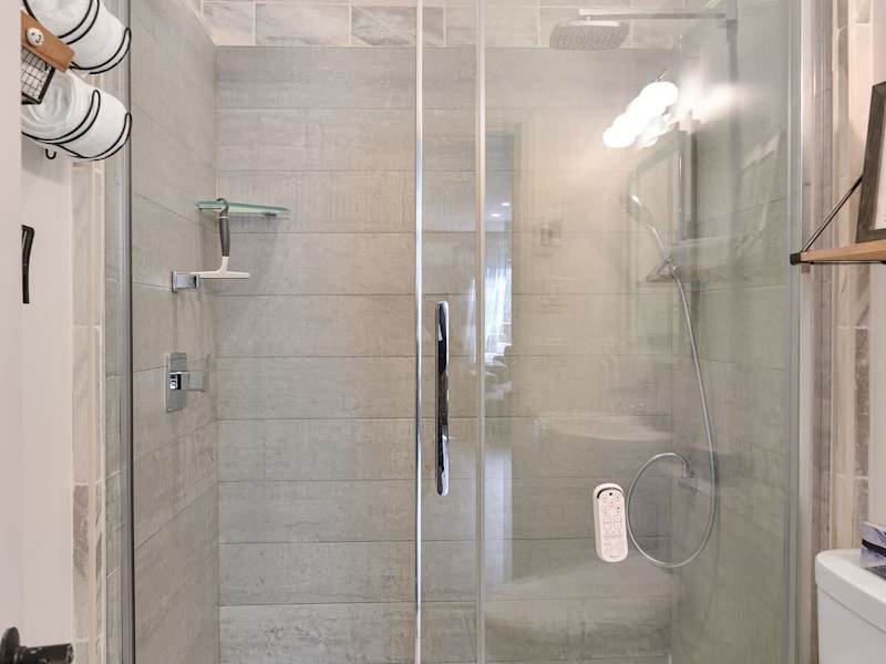 Main 3 piece bathroom with walk in shower.