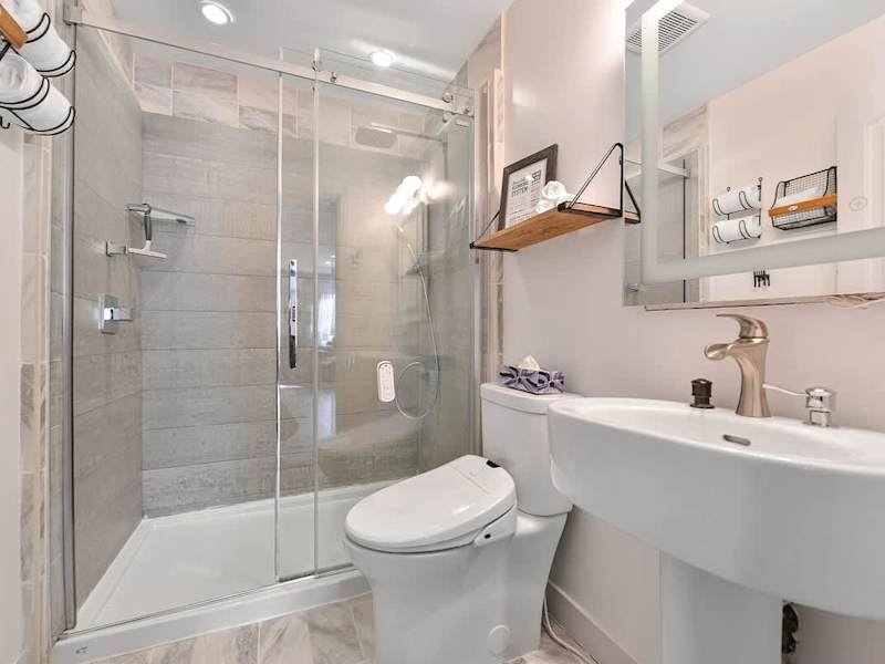 Main 3 piece bathroom with walk in shower.