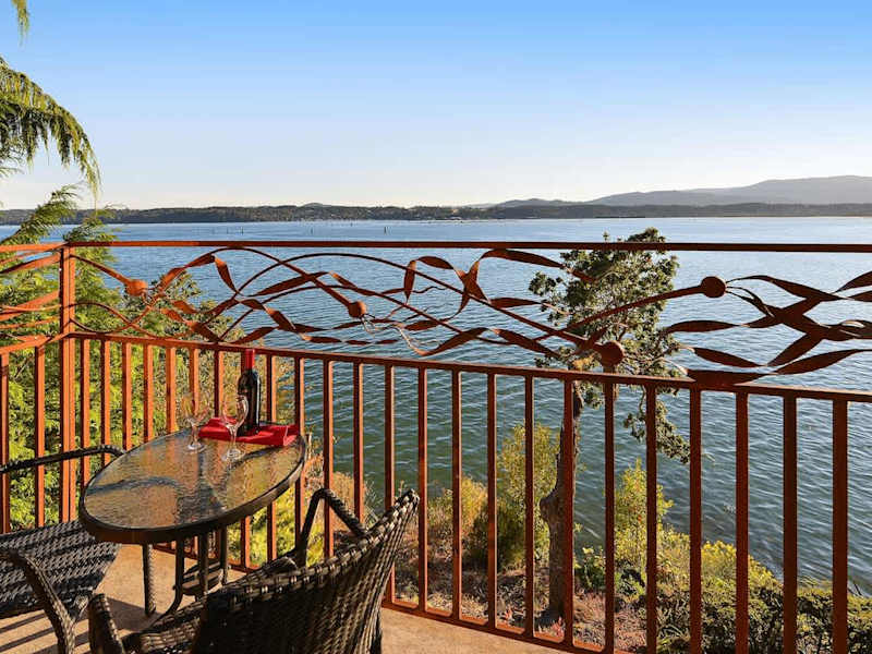 Private balcony with bistro set to enjoy the bayside experience.