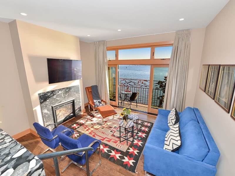 Well appointed living room with amazing bay views.