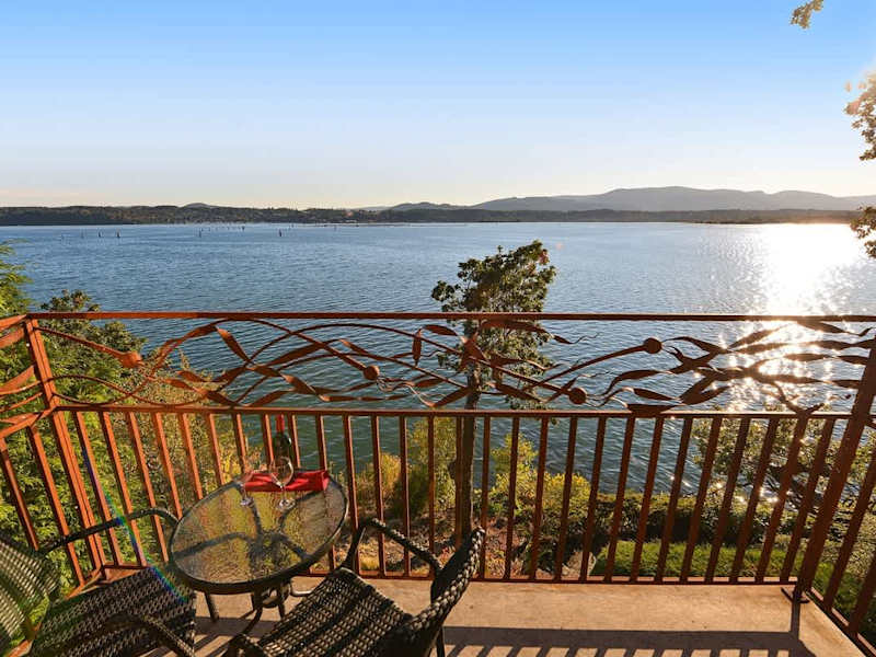 Private balcony with bistro set to enjoy the bayside experience.