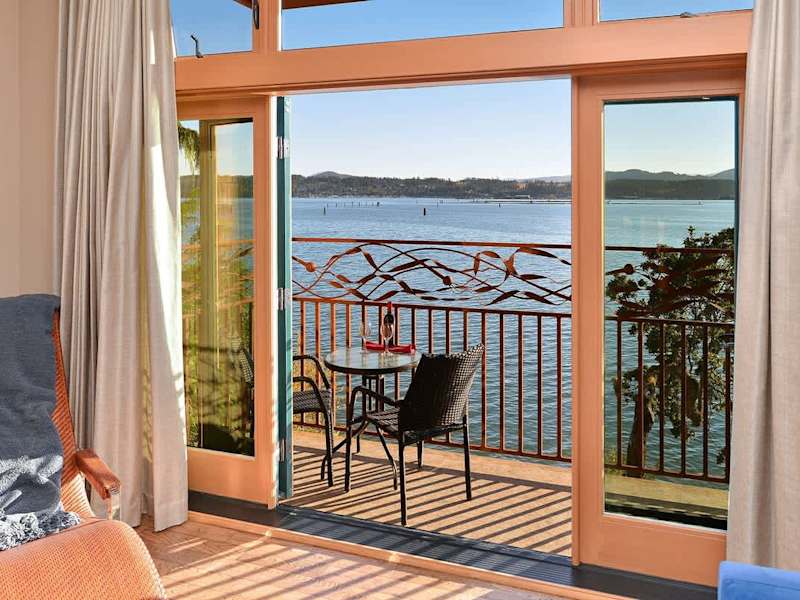 Well appointed living room with amazing bay views.