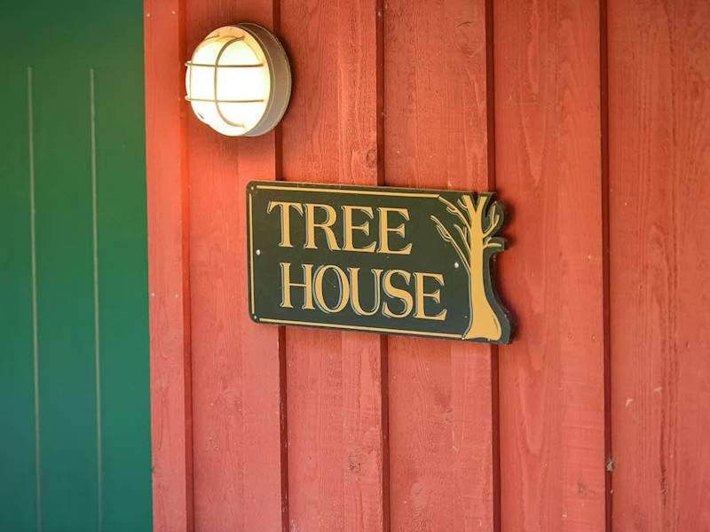 Welcome to the Tree House 2 Bedroom Suite Main Door.