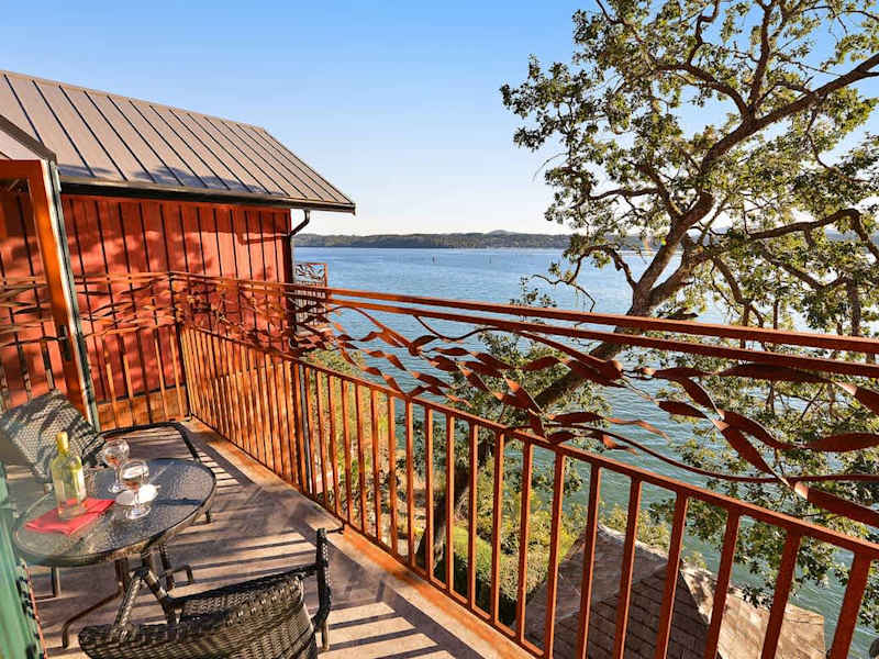 Main balcony with sweeping Bay Views and ornate kelp rails.