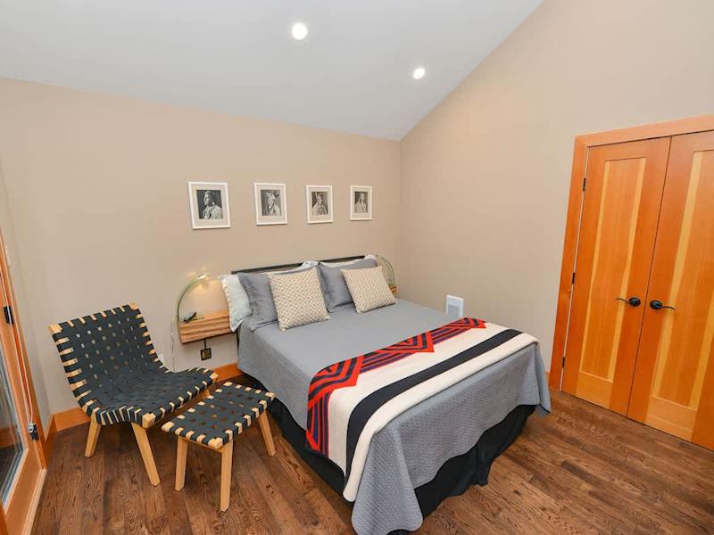 Second bedroom with private balcony.
