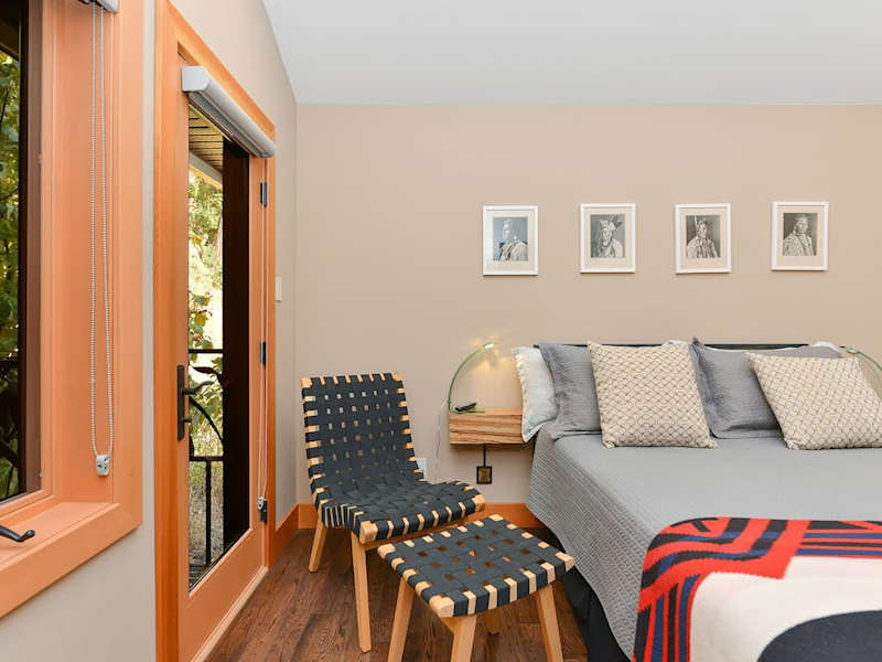 Second bedroom with private balcony.